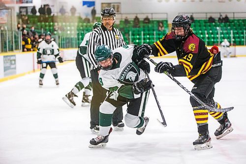 MIKAELA MACKENZIE / WINNIPEG FREE PRESS

Vincent Massey Trojan Braeden Lukas (8) and Portage Trojan Carson Dubois (19) go for the puck during a Manitoba AAAA high school boys hockey championship game in Selkirk on Friday, March 11, 2022. Standup.
Winnipeg Free Press 2022.