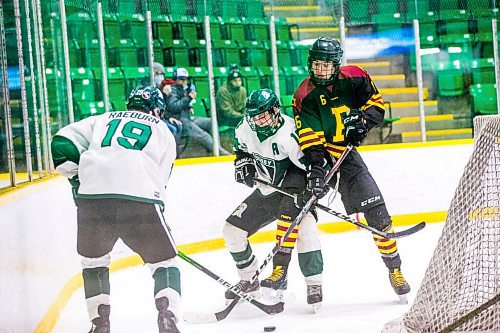 MIKAELA MACKENZIE / WINNIPEG FREE PRESS

Vincent Massey Trojan Grayson Galloway-Johnstone (10) and Portage Trojan Maddox Shindle (6) collide behind the net during a Manitoba AAAA high school boys hockey championship game in Selkirk on Friday, March 11, 2022. Standup.
Winnipeg Free Press 2022.