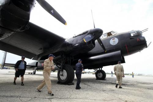 MIKE.DEAL@FREEPRESS.MB.CA 100729 - Thursday, July 29, 2010 -  The "Mynarski Memorial" Avro Lancaster Mk10 Bomber arrives at the Western Canada Aviation Museum and will be on display during the August long weekend. The flight crew does a visual inspection after landing the plane in Winnipeg. See Tania Kohut story MIKE DEAL / WINNIPEG FREE PRESS