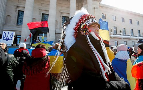 JOHN WOODS / WINNIPEG FREE PRESS
Chief Garrison Settee looks on as people gather at a rally in support of Ukraine and against the Russian invasion at the Manitoba Legislature Sunday, March 13, 2022.