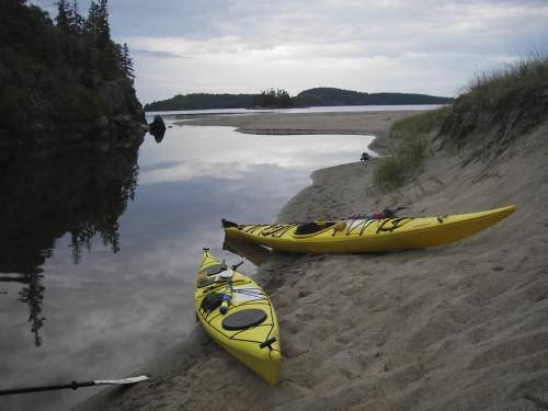 Northwestern Ontario should be part of Manitoba!¤ Kayak camping this month¤in the Gargantua area on the North Shore of Lake Superior-sky threatening rain reflected¤in river mouth on Warp Bay. ¤ Greg Petzold  show us your summer 2010 winnipeg free press