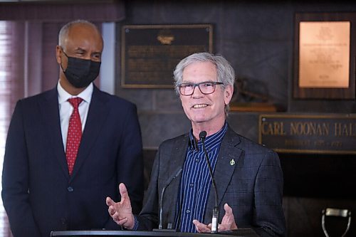 MIKE DEAL / WINNIPEG FREE PRESS
(from left) Ahmed Hussen, Minister of Housing and Diversity and Inclusion, Jim Carr, Member of Parliament for Winnipeg South Centre, during the announcement that $11.5 million in federal funding went in to renovating homes in the Westboine Park Housing Cooperative at 32 Shelmerdine Drive. 
The federal funding, along with $8 million from the Assiniboine Credit Union, resulted in new roofs, siding, insulation and windows for the homes.
See Katie May story
220314 - Monday, March 14, 2022.