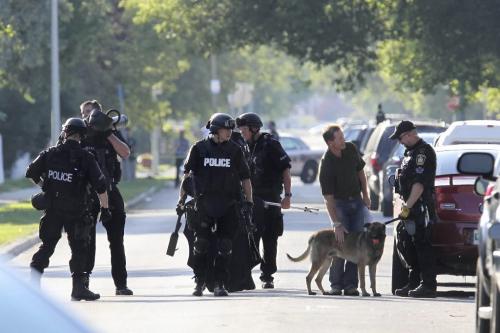 MIKE.DEAL@FREEPRESS.MB.CA 100730 - Friday, July 30, 2010 -  Members of the Winnipeg Police Service Tactical Unit entered a house on Alexander (1600 Alexander) following a shooting that happened on the street. See Jen Skerritt story MIKE DEAL / WINNIPEG FREE PRESS