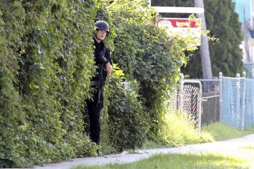 MIKE.DEAL@FREEPRESS.MB.CA 100730 - Friday, July 30, 2010 -  Members of the Winnipeg Police Service Tactical Unit entered a house on Alexander (1600 Alexander) following a shooting that happened on the street. See Jen Skerritt story MIKE DEAL / WINNIPEG FREE PRESS