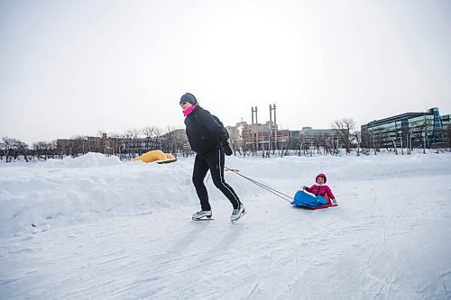 MIKAELA MACKENZIE / WINNIPEG FREE PRESS

Twila Fillion pulls her daughter, Raphaëlle Fillion (two), on an open section of the River Trail at The Forks, which is now closed from Queen Elizabeth Way to Churchill Drive, in Winnipeg on Tuesday, March 15, 2022. Standup.
Winnipeg Free Press 2022.