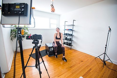 MIKAELA MACKENZIE / WINNIPEG FREE PRESS

Johanna Seier, founder of The Fit Girl Gang, poses for a portrait in her home workout space, where she filmed most of the workouts on the newly launched app, in Winnipeg on Tuesday, March 15, 2022. For Gabby story.
Winnipeg Free Press 2022.