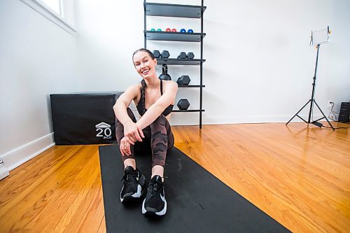 MIKAELA MACKENZIE / WINNIPEG FREE PRESS

Johanna Seier, founder of The Fit Girl Gang, poses for a portrait in her home workout space, where she filmed most of the workouts on the newly launched app, in Winnipeg on Tuesday, March 15, 2022. For Gabby story.
Winnipeg Free Press 2022.