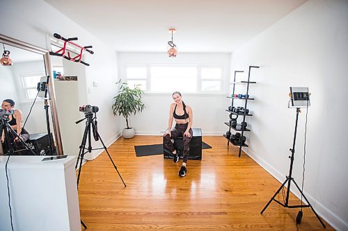 MIKAELA MACKENZIE / WINNIPEG FREE PRESS

Johanna Seier, founder of The Fit Girl Gang, poses for a portrait in her home workout space, where she filmed most of the workouts on the newly launched app, in Winnipeg on Tuesday, March 15, 2022. For Gabby story.
Winnipeg Free Press 2022.