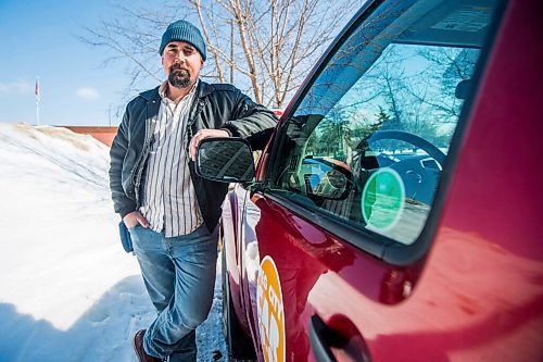 MIKAELA MACKENZIE / WINNIPEG FREE PRESS

William Belford, fleet manager for Peg City Car Co-op, poses for a portrait with the truck that had gas siphoned out of the tank in Winnipeg on Wednesday, March 16, 2022. For Erik story.
Winnipeg Free Press 2022.