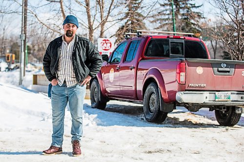 MIKAELA MACKENZIE / WINNIPEG FREE PRESS

William Belford, fleet manager for Peg City Car Co-op, poses for a portrait with the truck that had gas siphoned out of the tank in Winnipeg on Wednesday, March 16, 2022. For Erik story.
Winnipeg Free Press 2022.