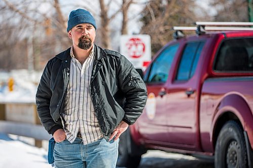 MIKAELA MACKENZIE / WINNIPEG FREE PRESS

William Belford, fleet manager for Peg City Car Co-op, poses for a portrait with the truck that had gas siphoned out of the tank in Winnipeg on Wednesday, March 16, 2022. For Erik story.
Winnipeg Free Press 2022.