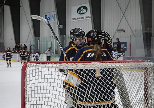 JESSICA LEE / WINNIPEG FREE PRESS

A teammate consoles Katrina Johnson (1) after the first goal was scored by Collège Jeanne-Sauvé player Annika Devine. J.H. Bruns won the second game out of three against Collège Jeanne-Sauvé 3-2 during the second finals game on March 16, 2022. The final game will determine the high school womens hockey team.

Reporter: Taylor



