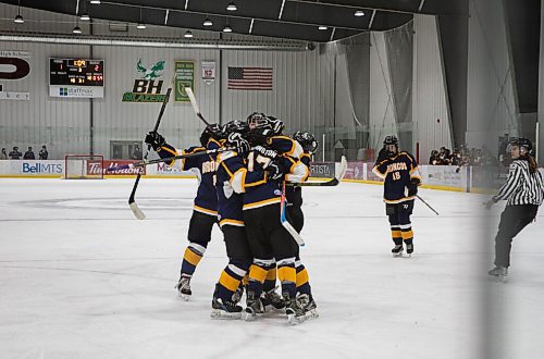JESSICA LEE / WINNIPEG FREE PRESS

J.H. Bruns players celebrate after Avery Lazarenko (18) scored the 4th goal of the game. J.H. Bruns won the second game out of three against Collège Jeanne-Sauvé 3-2 during the second finals game on March 16, 2022. The final game will determine the high school womens hockey team.

Reporter: Taylor


