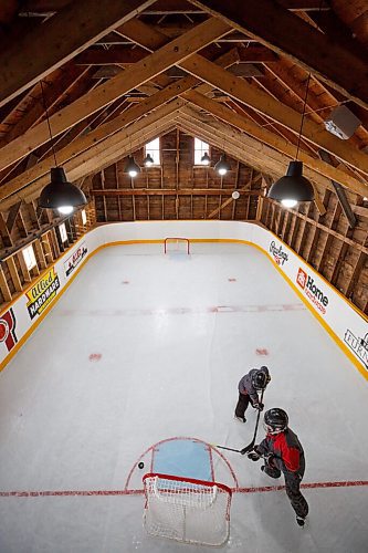 MIKE DEAL / WINNIPEG FREE PRESS
Matt and Sam Rawlings on the rink.
Dave Rawlings converted a barn on his property, with the help of his father Eric, into an indoor mini-skating rink. Including a heated change room. When the pandemic hit his kids, Sam and Matt, were able to skate almost everyday even during the worst lockdown stages.
See Ben Waldman story
220316 - Wednesday, March 16, 2022.
