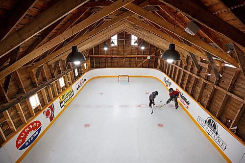 MIKE DEAL / WINNIPEG FREE PRESS
Matt (left) and Sam Rawlings (right) on the rink.
Dave Rawlings converted a barn on his property, with the help of his father Eric, into an indoor mini-skating rink. Including a heated change room. When the pandemic hit his kids, Sam and Matt, were able to skate almost everyday even during the worst lockdown stages.
See Ben Waldman story
220316 - Wednesday, March 16, 2022.