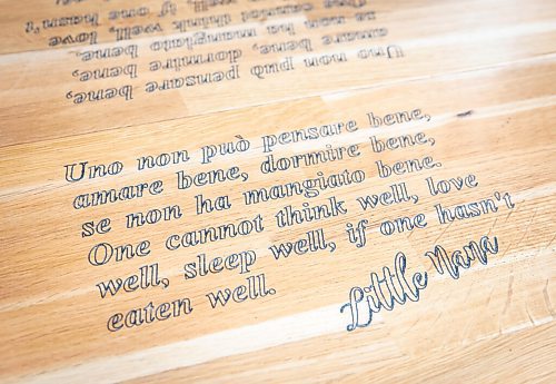 JESSICA LEE / WINNIPEG FREE PRESS

A wood engraving on a table is photographed at Little Nanas Italian Kitchen on March 15, 2022.

Reporter: Dave


