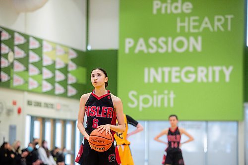 Mike Sudoma / Winnipeg Free Press
Sisler Spartans, Raia Guinto, pauses before taking a free throw during their game against the Dakota Lancers at Garden City Collegiate Thursday evening
March 17, 2022