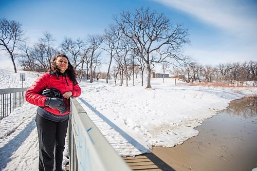 MIKAELA MACKENZIE / WINNIPEG FREE PRESS

Marianne Cerilli, past chairwoman of the Wolseley Residents Association, poses for a portrait beside Omand's Creek (where raw sewage was spilled after snowmelt overwhelmed construction being done to replace a combined sewer interceptor pipe) in Winnipeg on Friday, March 18, 2022.  For Kevin story.
Winnipeg Free Press 2022.