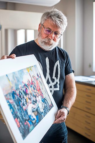 MIKAELA MACKENZIE / WINNIPEG FREE PRESS

Local artist Michael Boss, who is selling prints with proceeds going to the Ukrainian Red Cross, poses for a portrait at the Martha Street Studio in Winnipeg on Friday, March 18, 2022.  For Alan Small story.
Winnipeg Free Press 2022.