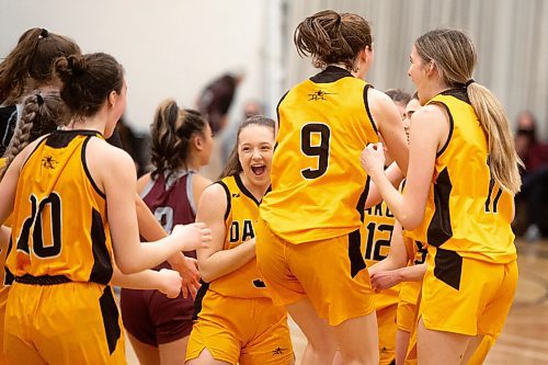 Mike Sudoma / Winnipeg Free Press
Dakota Lancers players cheer as they take the Farmers of Manitoba Provincial AAAA Girls Basketball Championship win against the Westwood Warriors at Maples Collegiate Saturday afternoon
March 19, 2022