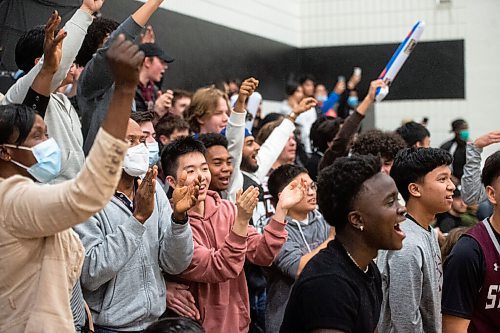 Mike Sudoma / Winnipeg Free Press
St Pauls Crusaders fans cheer from the stands as their team beats out  John Taylor Pipers for the Manitoba Dairy Farmers Provincial AAAA Boys Basketball Championship title at Maples Collegiate Saturday afternoon
March 19, 2022