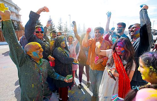 JOHN WOODS / WINNIPEG FREE PRESS
Ajay Gupta, left, and his family and friends, take part in Holi celebration of colour at the Hindu Temple on St. Annes Sunday, March 20, 2020.