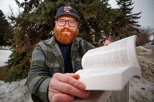 MIKE DEAL / WINNIPEG FREE PRESS
Holding a copy of the Mennonite Low German Dictionary, Altona-born Jared Falk, has created a Low German version of Wordle called Nah Yo-dle. The game has drawn players from across the country, and the languages lack of standardized spelling has already sparked some friendly controversy. Falk said he was excited to connect people with the language of his heritage.
See Cody Sellar story
220323 - Wednesday, March 23, 2022.