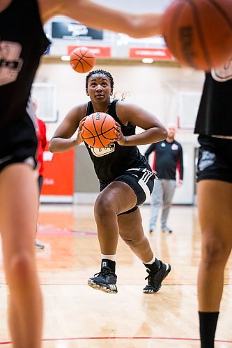 MIKAELA MACKENZIE / WINNIPEG FREE PRESS



Faith Hezekiah at Wesmen basketball practice at the Duckworth Centre in Winnipeg on Wednesday, March 23, 2022.  For Mike Sawatzky story.

Winnipeg Free Press 2022.