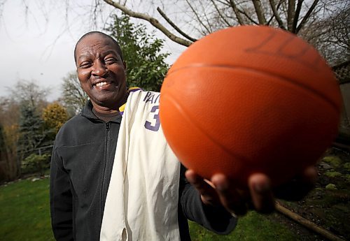 Maurice Sampson, 59, a former Gordon Bell High School Basketball Champion, photographed at his home in Surrey, BC, Wednesday, March 23, 2022. With the Jersey he wore when they won the title. (TREVOR HAGAN / WINNIPEG FREE PRESS) - for Sawatzky story
