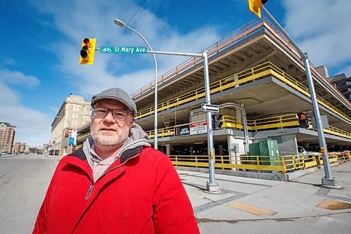 MIKE DEAL / WINNIPEG FREE PRESS
Historian Christian Cassidy outside The Bay Parkade at 450 Portage Avenue, Friday afternoon.
see Brenda Suderman story
220325 - Friday, March 25, 2022.