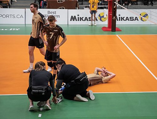 JESSICA LEE / WINNIPEG FREE PRESS

Bisons player Matthew Campbell (14) suffers an injury during the semi-finals game. University of Manitoba Bisons mens volleyball team played against Trinity Western University on March 25, 2022 at the IG Athletic Centre.

Reporter: Mike S.


