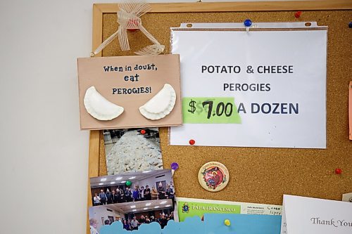 MIKE DEAL / WINNIPEG FREE PRESS
A sign says, "When in doubt, eat perogies!" on the bulletin board in the church basement.
Holy Eucharist operates a year-round Perogy Hotline to raise funds for the church. Amid the crisis in Ukraine, the volunteers have started donating a portion of their proceeds to humanitarian efforts in the country.
see Eva Wasney story
220324 - Thursday, March 24, 2022.