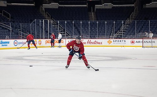 JESSICA LEE / WINNIPEG FREE PRESS

Ville Heinola (14) is photographed at Jets practice at Canada Life Centre on March 29, 2022.
