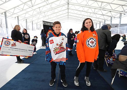 \RUTH BONNEVILLE / WINNIPEG FREE PRESS

Local - WASAC Jets/Moose

Alec Whitford (11yrs) and Marlena Parenteau (17yrs) model the new WASAC Follow Your Dreams jerseys at event Tuesday.

Jets and Moose hold precursor event to their WASAC (Winnipeg Aboriginal Sport Achievement Centre) night on Tuesday at Camp Manitou with an unveiling of their new WASAC Follow Your Dreams jerseys. Also during the event was a cultural performance by the Southern Thunderbird Medicine Drum group along with Métis singer Krista Rey, and students from Isaac Brock School Cree-language bilingual program singing Oh Canada.  

More info:

Winnipeg Jets and Manitoba Moose will again celebrate Indigenous culture by hosting their annual WASAC (Winnipeg Aboriginal Sport Achievement Centre) Night and Follow Your Dreams Day games. The Jets WASAC Night will take place on Saturday, April 2 vs. the Los Angeles Kings and the Moose Follow Your Dreams Day will follow on Sunday, April 3 vs. the Toronto Marlies.
Both the Jets WASAC jerseys and the Moose Follow Your Dreams jerseys will be auctioned off to raise funds that will be put
 back into the WASAC initiative to create opportunity for Indigenous youth across the province. 

March 29th,  2022
