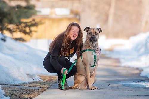 Mike Sudoma / Winnipeg Free Press
Sara Anema and her pup Finley share moment while on a walk Thursday evening. Sara volunteers her time managing the Winnipeg Branch of the Animal Food Bank.
March 31, 2022