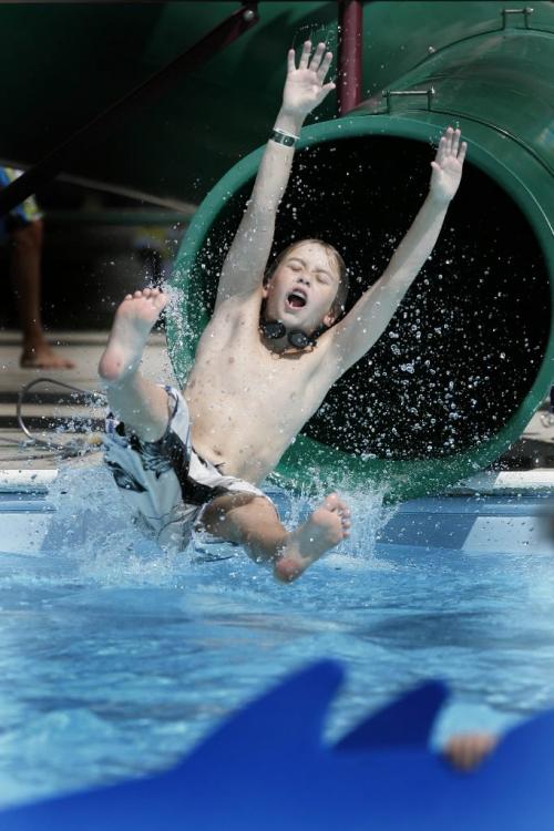 Graham Mayes (13) beats the heat at Kildonan Park in Winnipeg, Sunday, August 8, 2010. Temperatures were expected to reach 33 degrees celcius. WINNIPEG FREE PRESS/John Woods