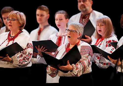 JOHN WOODS / WINNIPEG FREE PRESS
Linda Hunter, right, signing with the O. Koshetz Choir, at the Stand With Ukraine Benefit Concert at Seven Oaks Performing Arts Centre Sunday, April 3, 2022. The concerts are in support of Ukraine Humanitarian Appeal during the Russian invasion.

Re: Piche