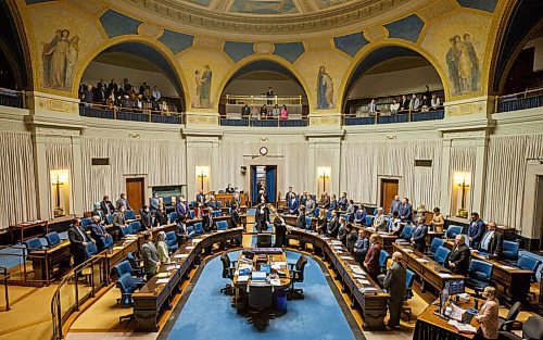 MIKE DEAL / WINNIPEG FREE PRESS
Everyone stands as the mace is brought into the assembly chamber, including the people in the public gallery which is open for the first time in since the start of the pandemic, Monday afternoon.
220404 - Monday, April 04, 2022.