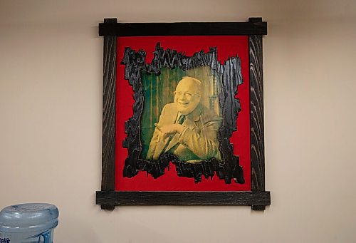 JESSICA LEE / WINNIPEG FREE PRESS

A portrait of Paul Schimnowskis father hangs upstairs in the offices next to a water cooler. 
Western Paint

Reporter: Dave