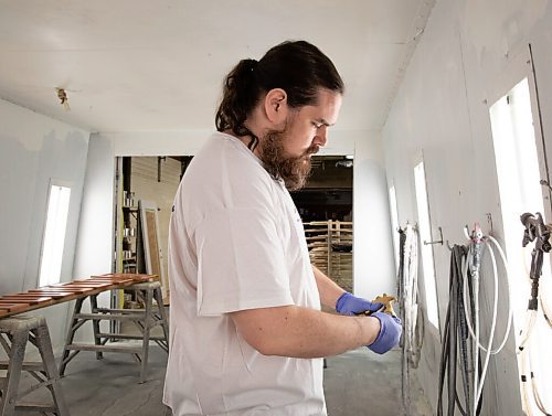 JESSICA LEE / WINNIPEG FREE PRESS

Jon Warren, who operates the furniture painting section of Western Paint is photographed preparing to prime furniture parts on April 4, 2022.

Reporter: Dave