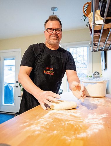 Mike Sudoma / Winnipeg Free Press
Bread maker, Jared Ozuks gets his hands dirty kneading a batch of dough in his kitchen Wednesday
April 5, 2022