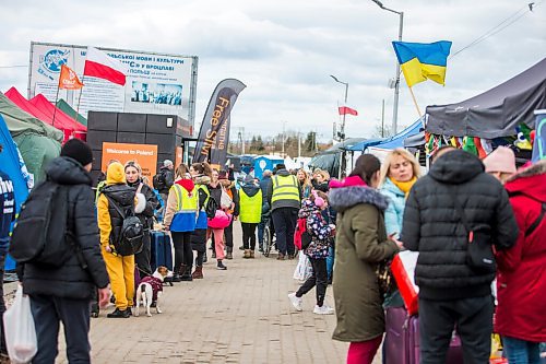 MIKAELA MACKENZIE / WINNIPEG FREE PRESS

Aid tents line the walkway to the border crossing at Medyka on Wednesday, April 6, 2022. For Melissa story.
Winnipeg Free Press 2022.