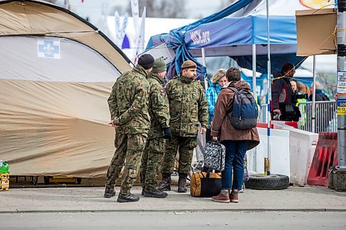 MIKAELA MACKENZIE / WINNIPEG FREE PRESS

Aid tents line the walkway to the border crossing at Medyka on Wednesday, April 6, 2022. For Melissa story.
Winnipeg Free Press 2022.