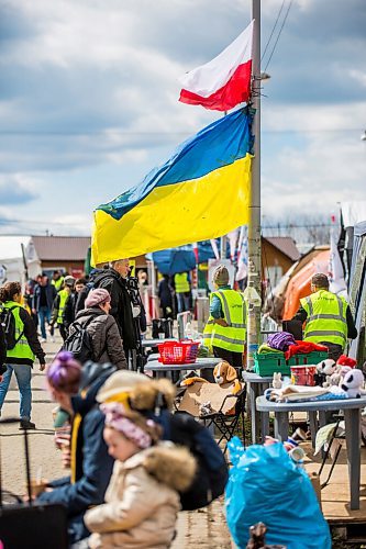 MIKAELA MACKENZIE / WINNIPEG FREE PRESS

Aid tents line the walkway to the border crossing at Medyka on Wednesday, April 6, 2022. For Melissa story.
Winnipeg Free Press 2022.