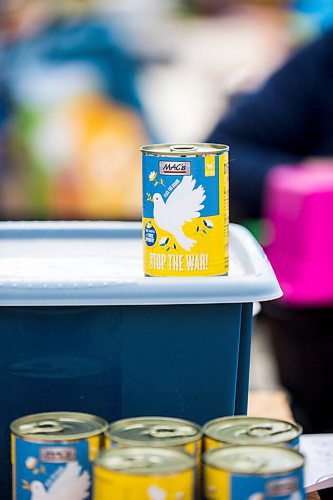 MIKAELA MACKENZIE / WINNIPEG FREE PRESS

An aid station with help for pets has cans of cat food with anti-war branding on the walkway to the border crossing at Medyka on Wednesday, April 6, 2022. For Melissa story.
Winnipeg Free Press 2022.