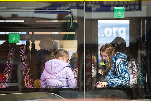 MIKAELA MACKENZIE / WINNIPEG FREE PRESS

Kids wait on a bus at the border in Medyka on Thursday, April 7, 2022. For Melissa story.
Winnipeg Free Press 2022.