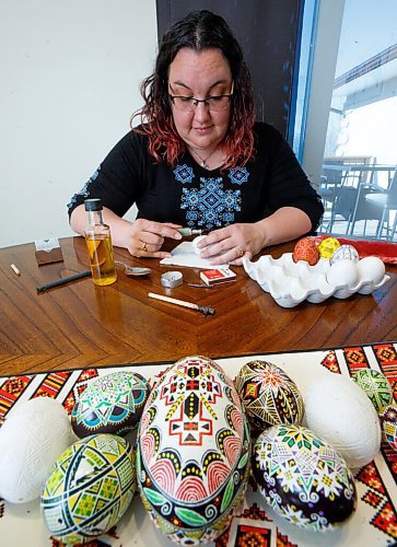 MIKE DEAL / WINNIPEG FREE PRESS
Tracy puts the first layer of beeswax onto an egg.
Tracy Rossier has been making and selling Ukrainian pysanky eggs for years; her Instagram bio puts it succinctly, "Manitoba Ukrainian egg artist. Saving the world one pysanka at a time."
See Dave Sanderson story
220408 - Friday, April 08, 2022.