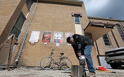 RUTH BONNEVILLE / WINNIPEG FREE PRESS

Stand-up. Easter Artwork 
 
Home Street Mennonite Church members put up local artwork for stations of the cross outside of the building in preparation for Easter. These are large posters featuring copies of original art  being pasted with a flour and water mixture on the exterior brick of the church in the alley between Portage Ave and Home Street This is the start of the Christian Holy Week when people reflect on the suffering and death of Jesus Christ through installations like this. 

Photo of church member,  Peter Funk, mixing two pots of paste  together to use for the remaining installations.  

See Brenda Suderman for more info.

April 11th,  2022
