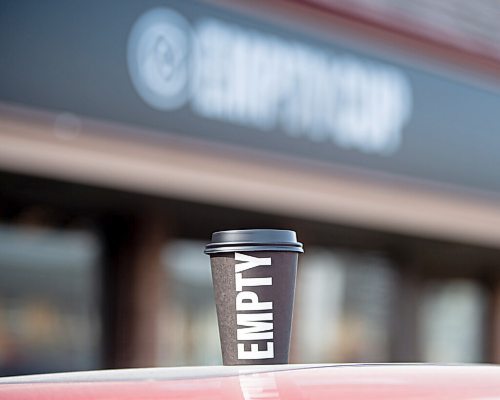 Mike Sudoma / Winnipeg Free Press
A vanilla latte served in an Empty Cup branded to go cup outside of their shop on Academy Rd Tuesday morning
April 12, 2022