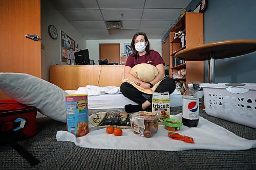 RUTH BONNEVILLE / WINNIPEG FREE PRESS

Local - Overnight Senior Care 

Laurie Cerqueti executive officer at Saul and Claribel Simkin Centre sits on her makeshift bed in her office and preps snacks for the evening for her and other staff to bunk over at the centre because of the blizzard to care for seniors


 
April 13h,  2022
